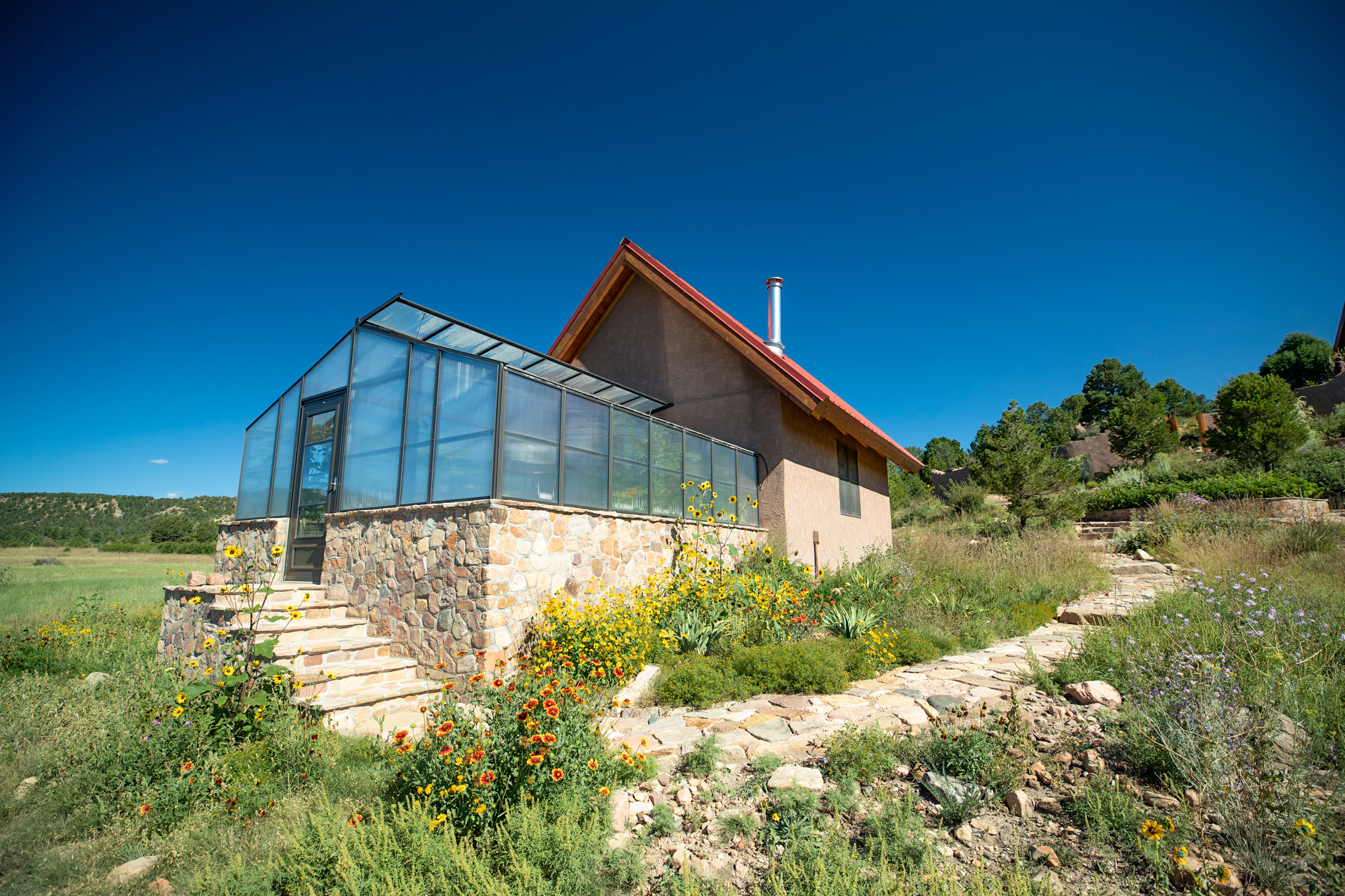 green house on a ranch