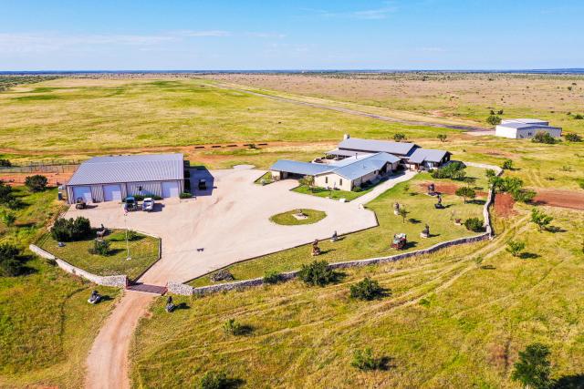 house and barn on a ranch